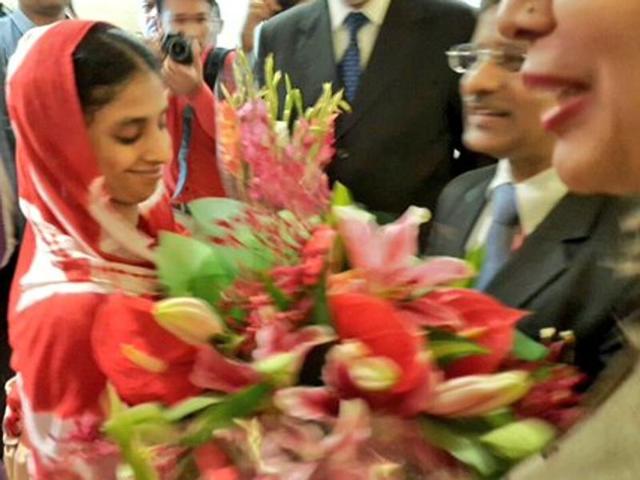 Geeta is greeted as she arrives at the Indira Gandhi International Airport in New Delhi. (Photo: @MEAIndia)