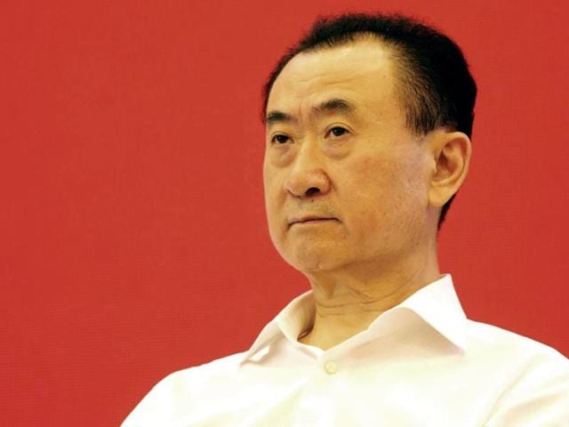 This picture taken on July 16, 2015 shows Wang Jianlin, chairman of property giant Wanda Group, attending the China Brand Forum in Beijing. (AFP) This picture taken on July 16, 2015 shows Wang Jianlin, chairman of property giant Wanda Group, attending the China Brand Forum in Beijing. (AFP)