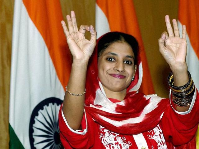 Geeta, a deaf-mute Indian woman who accidentally crossed over to Pakistan more than a decade ago, gestures at a press conference in New Delhi after her return to India. (PTI) Geeta, a deaf-mute Indian woman who accidentally crossed over to Pakistan more than a decade ago, gestures at a press conference in New Delhi after her return to India. (PTI)