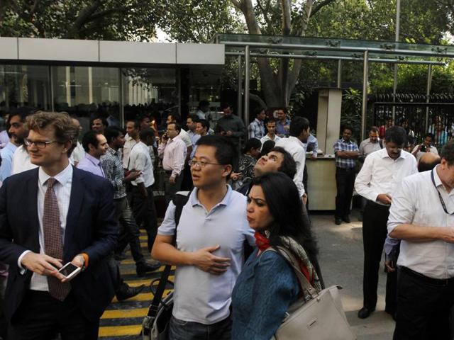 People gather outside HT House after tremors were felt in New Delhi, India, on Monday. (HT Photo/Virendra Singh) People gather outside HT House after tremors were felt in New Delhi, India, on Monday. (HT Photo/Virendra Singh)