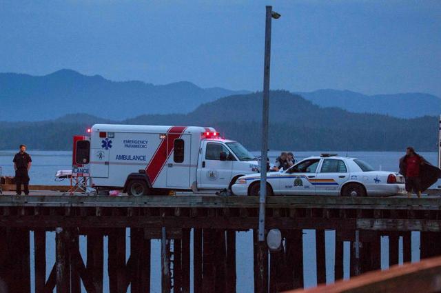 Rescue personnel mounting a search for victims of a capsized whale watching boat park on a wharf in Tofino, British Columbia. (Reuters Photo) Rescue personnel mounting a search for victims of a capsized whale watching boat park on a wharf in Tofino, British Columbia. (Reuters Photo)