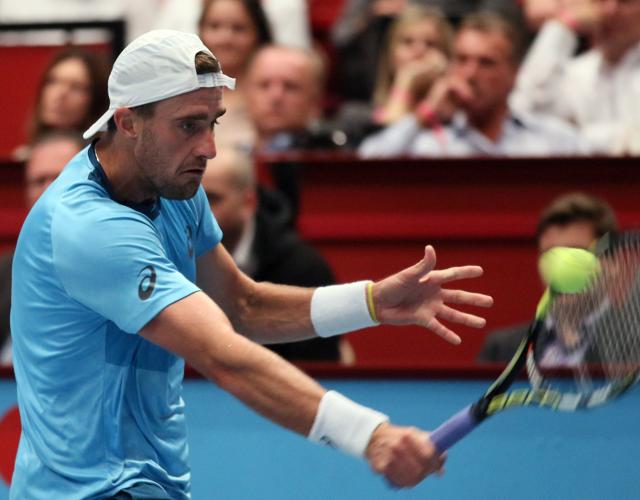 Steve Johnson hits a slice backhand to David Ferrer during the final. (AP Photo) Steve Johnson hits a slice backhand to David Ferrer during the final. (AP Photo)