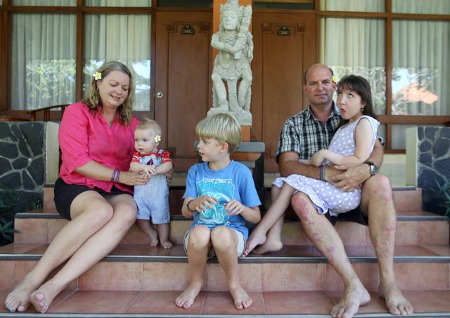 Jenn and Mark Hooper sit for a photo with their three children: From left, Cody, Zak and Charley. (AP) Jenn and Mark Hooper sit for a photo with their three children: From left, Cody, Zak and Charley. (AP)