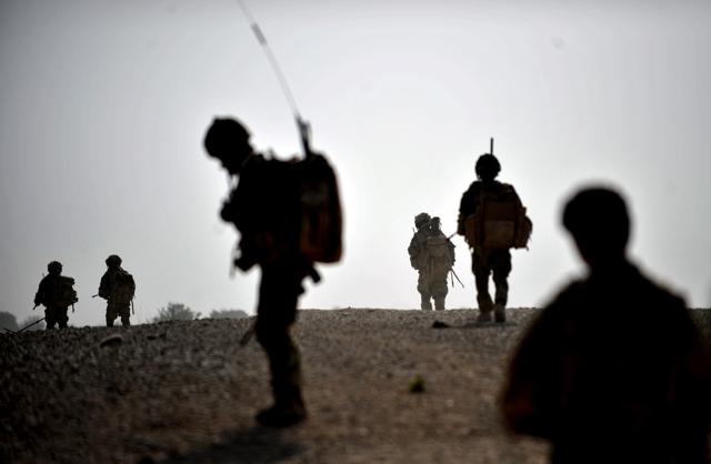 A file picture shows soldiers of A Company from the 1st Battalion of Royal Gurkha Rifles and Afghan National Police patrolling in Nahr e Saraj village, in Helmand. (AFP) A file picture shows soldiers of A Company from the 1st Battalion of Royal Gurkha Rifles and Afghan National Police patrolling in Nahr e Saraj village, in Helmand. (AFP)
