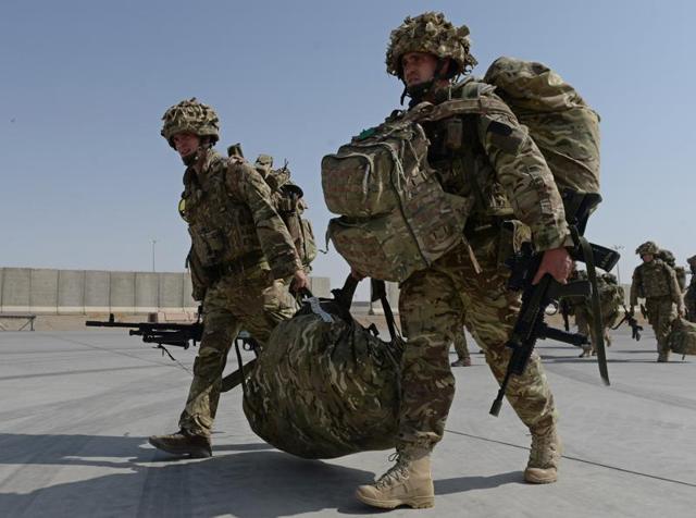 A file picture shows British soldiers walking with their gear after arriving in Kandahar. (AFP) A file picture shows British soldiers walking with their gear after arriving in Kandahar. (AFP)