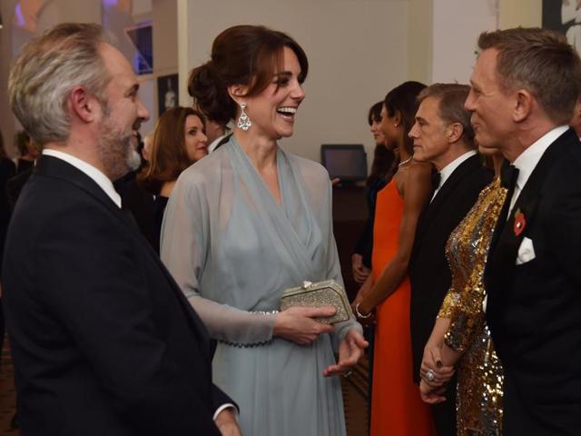 Britain's Catherine, Duchess of Cambridge (C) meets British actor Daniel Craig (R) at the world premiere of the new James Bond film Spectre. (AFP)