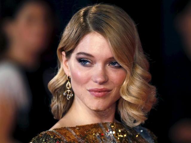 Lea Seydoux poses for photographers on the red carpet at the world premiere of the new James Bond 007 film Spectre at the Royal Albert Hall in London. (REUTERS)