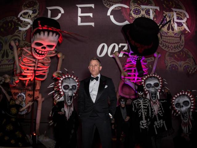 Daniel Craig poses for photographers upon arrival at the James Bond Spectre party in London. (AP)
