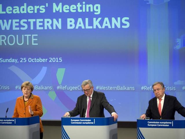German Chancellor Angela Merkel, left, speaks during a media conference at the conclusion of an EU summit at EU headquarters in Brussels. (AP) German Chancellor Angela Merkel, left, speaks during a media conference at the conclusion of an EU summit at EU headquarters in Brussels. (AP)