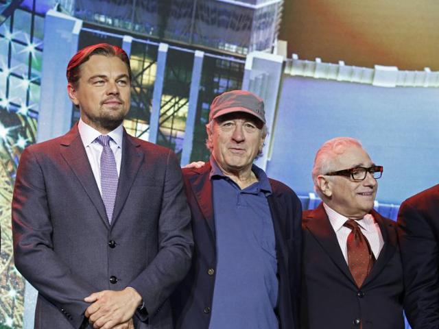 From left, film stars Leonardo DiCaprio, Robert De Niro and director Martin Scorsese pose for photos during a launching ceremony of the Studio City project in Macau.(AP)