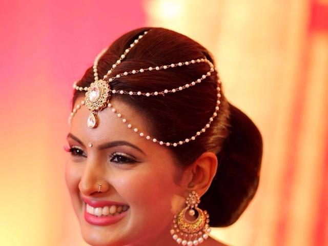 Geeta’s make up was done by Ajay Shelar and Pooja Gupta did the hairdo (Image courtesy - Israni Photography)