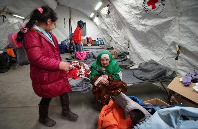 105-year old Afghan woman refugee Bibihal Uzbeki from Kunduz, Afghanistan, rests in Croatia's main refugee camp at Opatovac. (AP) 105-year old Afghan woman refugee Bibihal Uzbeki from Kunduz, Afghanistan, rests in Croatia's main refugee camp at Opatovac. (AP)