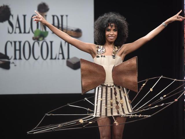 French and Cameroonian writer Elizabeth Tchoungui in a chocolate dress. (AFP)