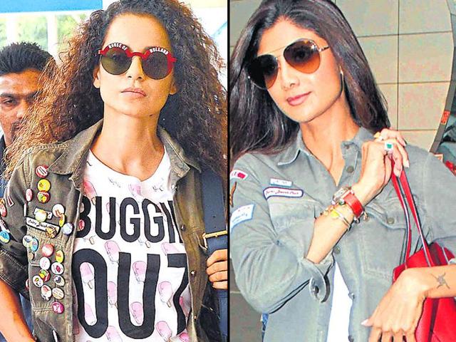 Kangana Ranaut and Shilpa Shetty showing off their jackets. Kangana Ranaut and Shilpa Shetty showing off their jackets.