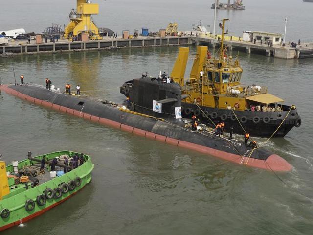 The INS Kalvari, one of the six Scorpene diesel-electric attack submarines, is set afloat at the Mazagaon Dock in Mumbai on Thursday.(Vijayanand Gupta/HT photo) The INS Kalvari, one of the six Scorpene diesel-electric attack submarines, is set afloat at the Mazagaon Dock in Mumbai on Thursday.(Vijayanand Gupta/HT photo)