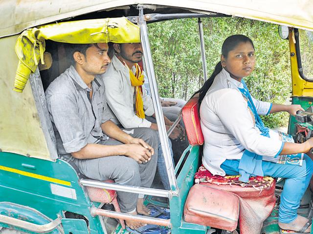 The 30-year-old says she uses her earnings to pay the school fees of her children and is fearless on the roads.(Sakib Ali/HT Photo)