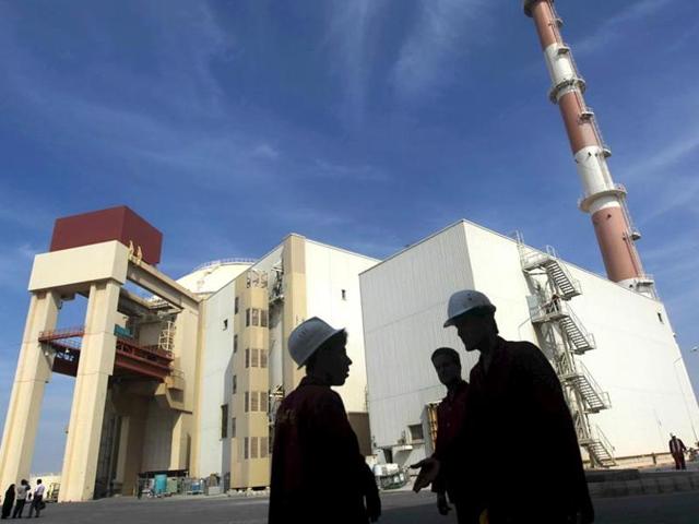 Iranian workers stand in front of the Bushehr nuclear power plant in this file photo. Former Iranian President Akbar Hashemi Rafsanjani has said that Pakistan provided designs and technology for Iran’s nuclear programme. (Reuters) Iranian workers stand in front of the Bushehr nuclear power plant in this file photo. Former Iranian President Akbar Hashemi Rafsanjani has said that Pakistan provided designs and technology for Iran’s nuclear programme. (Reuters)