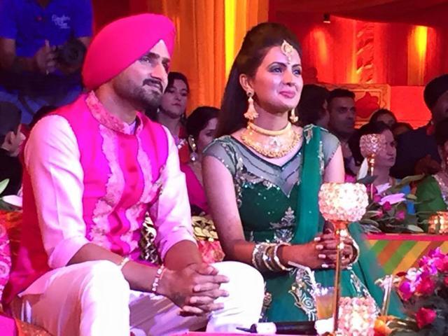Harbhajan Singh and Geeta Basra at a pre-wedding ceremony in Punjab. (HT Photo)