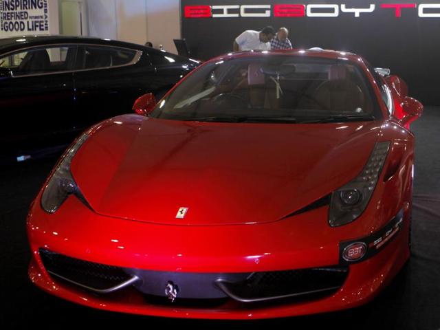 A Ferrari, in its trademark red, on display on Friday. (Satish Bate/HT)