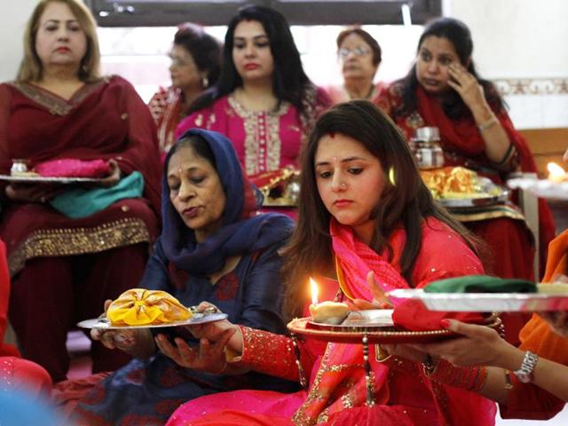 According to tradition, married women fast from sunrise to moonrise for safety and longevity of their husbands. (Sanchit Khanna/HT Photo)