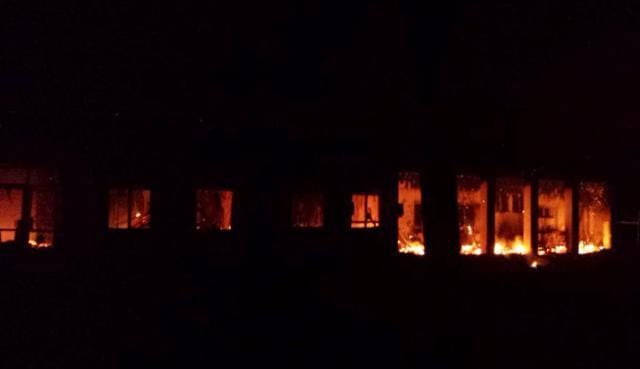 In this file photo, the Doctors Without Borders trauma centre is seen in flames after explosions near their hospital, in the northern Afghan city of Kunduz, Afghanistan. (AP Photo)