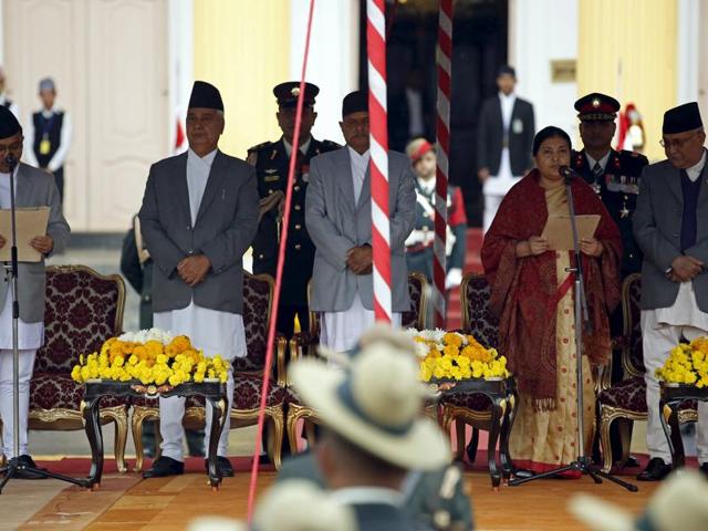 Chief Justice Kalyan Shrestha (L) administers the oath of office to Nepal's newly elected President Bidhya Bhandari (4th L) in the presence of former President Ram Baran Yadav (3rd L), former vice president Parmanand Jha (2nd L) and Prime Minister Khadga Prasad Sharma Oli, also known as KP Oli (R), at the presidential building "Shital Niwas" in Kathmandu, Nepal October 29, 2015. Nanda Bahadur Pun, former chief commander of Nepal’s People’s Liberation Army, the military wing of Maoists who fought a 10 year civil war, was on Saturday elected the country’s second vice president. (REUTERS Photo) Chief Justice Kalyan Shrestha (L) administers the oath of office to Nepal's newly elected President Bidhya Bhandari (4th L) in the presence of former President Ram Baran Yadav (3rd L), former vice president Parmanand Jha (2nd L) and Prime Minister Khadga Prasad Sharma Oli, also known as KP Oli (R), at the presidential building "Shital Niwas" in Kathmandu, Nepal October 29, 2015. Nanda Bahadur Pun, former chief commander of Nepal’s People’s Liberation Army, the military wing of Maoists who fought a 10 year civil war, was on Saturday elected the country’s second vice president. (REUTERS Photo)