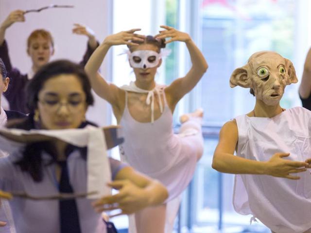 Camille Reaux wears a mask depicting Dobby, a character from Harry Potter, at a Pacific Northwest Ballet School class Friday, Oct. 30, 2015, in Seattle. (AP)