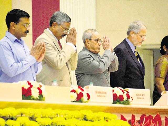 President Pranab Mukherjee, Lt-Governor Najeeb Jung and chief minister Arvind Kejriwal at the inauguration of the golden jubilee celebrations of the Delhi High Court in Delhi on Saturday. (PTI Photo) President Pranab Mukherjee, Lt-Governor Najeeb Jung and chief minister Arvind Kejriwal at the inauguration of the golden jubilee celebrations of the Delhi High Court in Delhi on Saturday. (PTI Photo)