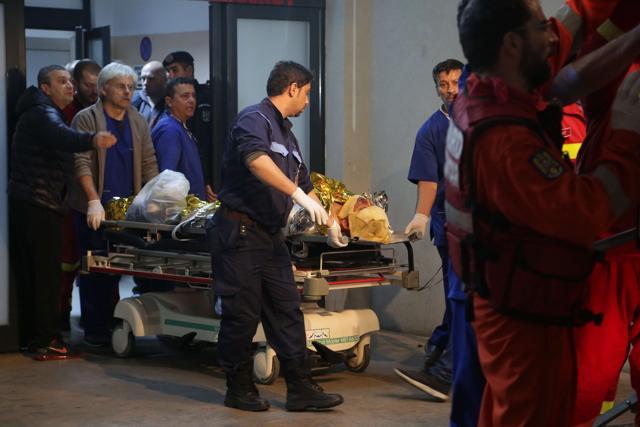 A victim of the fire at a club is transported to an emergency hospital in Bucharest. (AFP) A victim of the fire at a club is transported to an emergency hospital in Bucharest. (AFP)