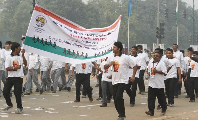 Participants during the Run for Unity on Rashtriya Ekta Diwas, at Rajpath, in New Delhi. The OM hit out against dynasty politics, and stressed that an India that follows the path to unity will be a great nation. (Virendra Singh Gosain/ HT photo)