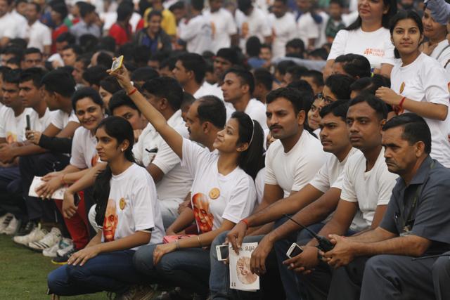 Participants during the Run for Unity on Rashtriya Ekta Diwas in New Delhi pose for pictures. (Virendra Singh Gosain/ HT photo)