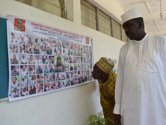 In this photo taken Friday, Oct. 30, 2015, a poster featuring wanted Boko Haram members, pasted onto the wall by Nigeria army in Maiduguri, Nigeria.(AP Photo) In this photo taken Friday, Oct. 30, 2015, a poster featuring wanted Boko Haram members, pasted onto the wall by Nigeria army in Maiduguri, Nigeria.(AP Photo)