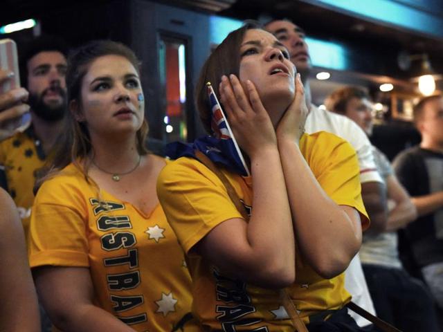 Australian fans watch the final on a big screen in a Sydney sports bar. (AFP)