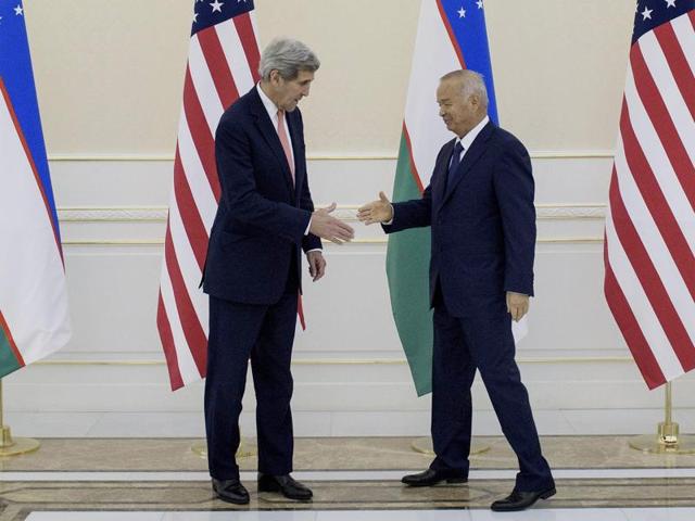 Uzbek President Islam Karimov (R) shakes hands with US secretary of state John Kerry before a meeting at the Palace of Forums on the President's Residential Compound in Samarkand. (Reuters Photo) Uzbek President Islam Karimov (R) shakes hands with US secretary of state John Kerry before a meeting at the Palace of Forums on the President's Residential Compound in Samarkand. (Reuters Photo)