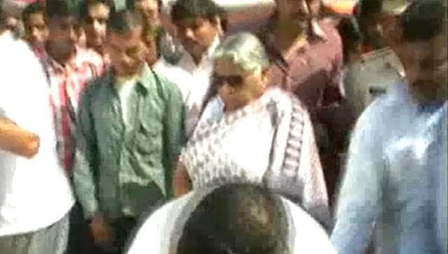 Madhya Pradesh minister Kusum Mehdele in a frame from the video in which she is seen allegedly kicking a minor boy. (HT Photo) Madhya Pradesh minister Kusum Mehdele in a frame from the video in which she is seen allegedly kicking a minor boy. (HT Photo)