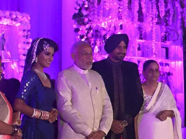 Prime Minister Narendra Modi paid a visit to Harbhajan Singh and Geeta Basra on Sunday evening on their wedding reception. (Facebook/HARBHAJANSINGH)