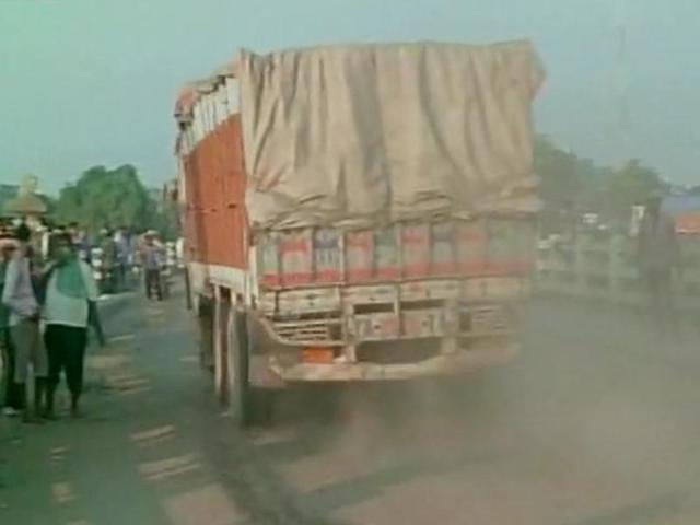 Nepalese police removed protesters from a key border point Monday to allow more than 200 vehicles stranded for the past 40 days to cross into India. (ANI Photo) Nepalese police removed protesters from a key border point Monday to allow more than 200 vehicles stranded for the past 40 days to cross into India. (ANI Photo)