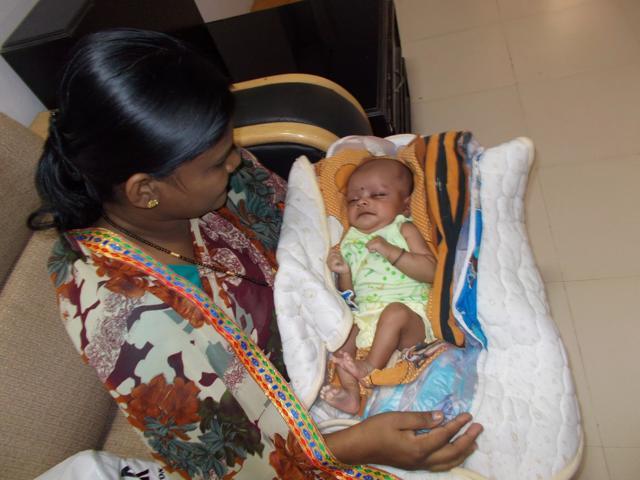 Aradhna - the first baby born after reverse vasectomy of a Maoist leader Bhagat Jade who surrendered in Rajnandgaon. (HT Photo)
