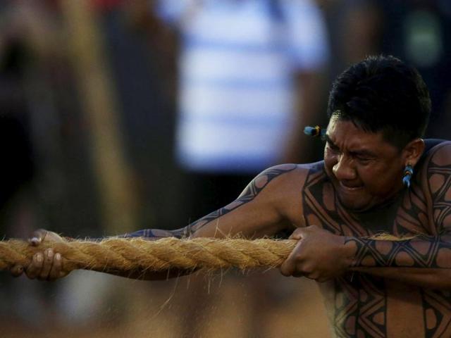 An indigenous man from the Baikiri tribe of Brazil competes in a tug-of-war competition at the I World Games for Indigenous Peoples in Palmas, Brazil. (REUTERS) An indigenous man from the Baikiri tribe of Brazil competes in a tug-of-war competition at the I World Games for Indigenous Peoples in Palmas, Brazil. (REUTERS)