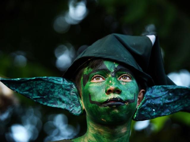 A young reveler takes part in a parade called "La Calabiuza". (AFP) A young reveler takes part in a parade called "La Calabiuza". (AFP)