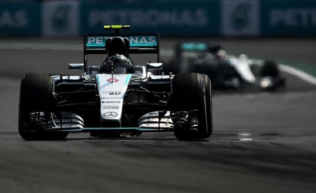 Nico Rosberg of Mercedes drives ahead of team mate Lewis Hamilton during the Formula One Grand Prix of Mexico at Autodromo Hermanos Rodriguez. (AFP)
