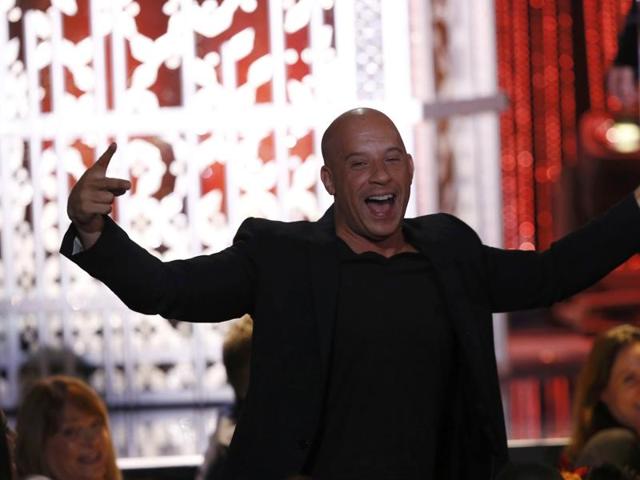 Actor Vin Diesel reacts in the audience as Furious 7 is announced as the winner of the Hollywood Blockbuster Award at the Hollywood Film Awards. (REUTERS)