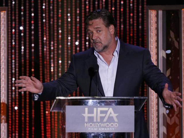 Actor Russell Crowe presents the Hollywood Producer Award at the Hollywood Film Awards in Beverly Hills, California. (REUTERS)