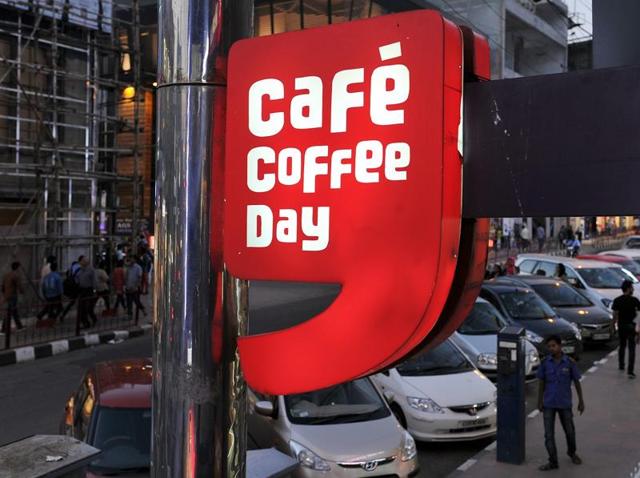 The logo of Indian coffee retail chain Cafe Coffee Day is seen at its first outlet which was opened in 1996 on Brigade Road, in Bangalore. (AFP) The logo of Indian coffee retail chain Cafe Coffee Day is seen at its first outlet which was opened in 1996 on Brigade Road, in Bangalore. (AFP)