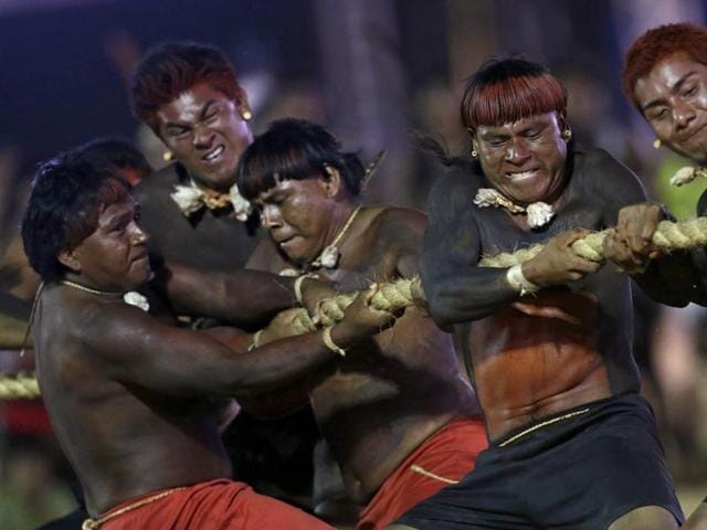 Indigenous men from the Gaviao tribe compete in a tug-of-war competition at the first World Games for Indigenous Peoples in Palmas. (REUTERS) Indigenous men from the Gaviao tribe compete in a tug-of-war competition at the first World Games for Indigenous Peoples in Palmas. (REUTERS)