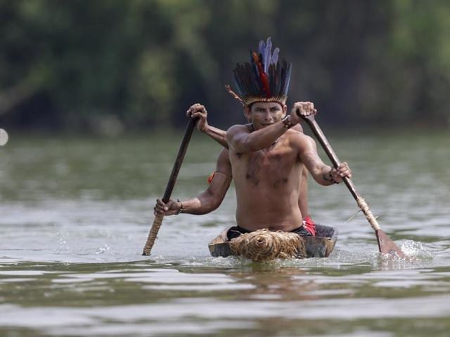 Indigenous men from Terena tribe compete in a canoeing competition during the first World Games for Indigenous Peoples in Palmas, Brazil. (REUTERS) Indigenous men from Terena tribe compete in a canoeing competition during the first World Games for Indigenous Peoples in Palmas, Brazil. (REUTERS)