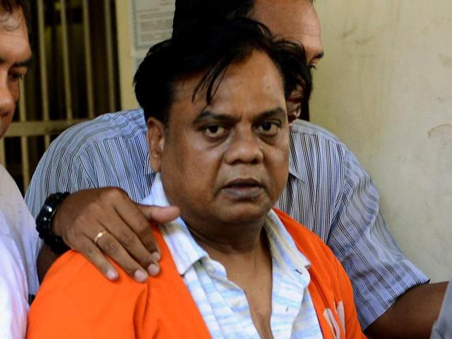 Chhota Rajan, is brought out from a holding cell at the Bali police headquarters in Denpasar on Bali island. (AFP Photo) Chhota Rajan, is brought out from a holding cell at the Bali police headquarters in Denpasar on Bali island. (AFP Photo)