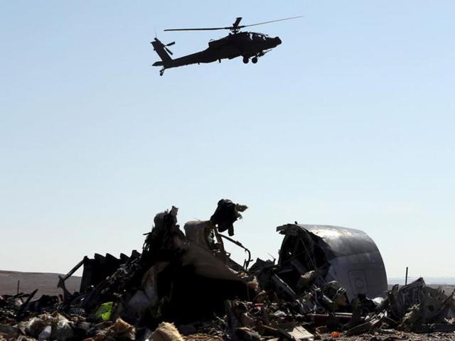 An Egyptian military helicopter flies over debris from a Russian airliner which crashed at the Hassana area in Arish city, north Egypt, November 1, 2015. REUTERS/Mohamed Abd El Ghany (REUTERS) An Egyptian military helicopter flies over debris from a Russian airliner which crashed at the Hassana area in Arish city, north Egypt, November 1, 2015. REUTERS/Mohamed Abd El Ghany (REUTERS)