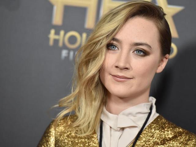 Saoirse Ronan is a frontrunner for Brooklyn as she arrives at the HFAs at the Beverly Hilton Hotel. (AP)