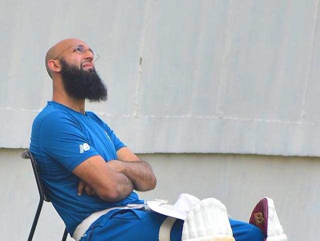South Africa’s Hashim Amla rests for a moment during a practice session at the PCA stadium, Mohali on Monday.  (Gurpreet Singh/HT) 